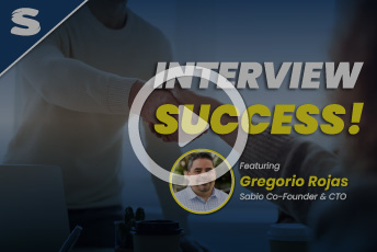 Interview Success! Featuring Gregorio Rojas, Sabio Co Founder and CTO. Play symbol overlaid to the image.